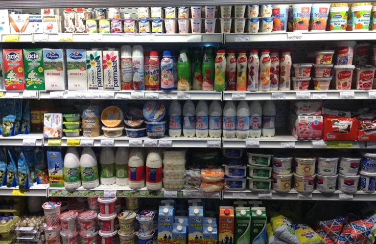 Commercial refrigerated display operating under changing cooling loads