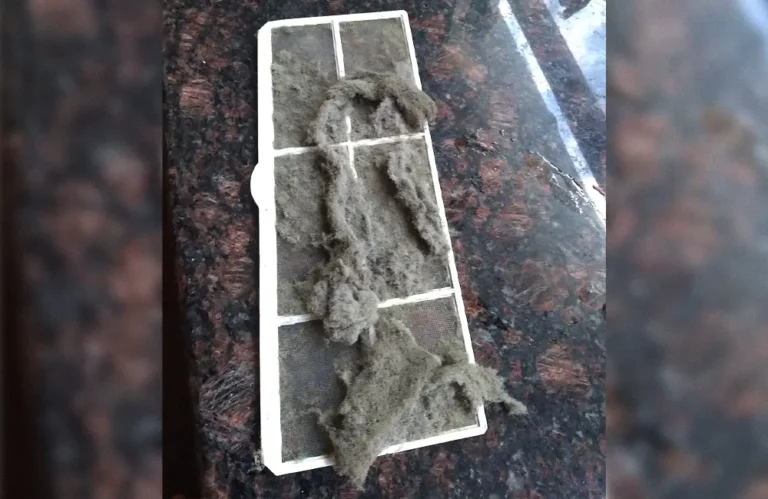 Dust-loaded air-conditioning filters removed for service