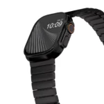 KW4024 black link watch band with butterfly clasp, close-up angled view on a display watch