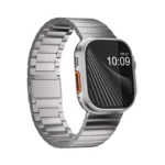 KW4024 Natural link watch band with magnetic clasp, angled front view on a display watch