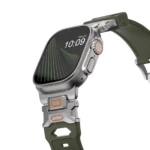 KW6004 Green FKM and titanium watch band, Natural hardware color, closer angled front view on a display watch