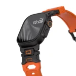 KW6004 Orange FKM and titanium watch band, Black Titanium hardware color, closer angled front view on a display watch
